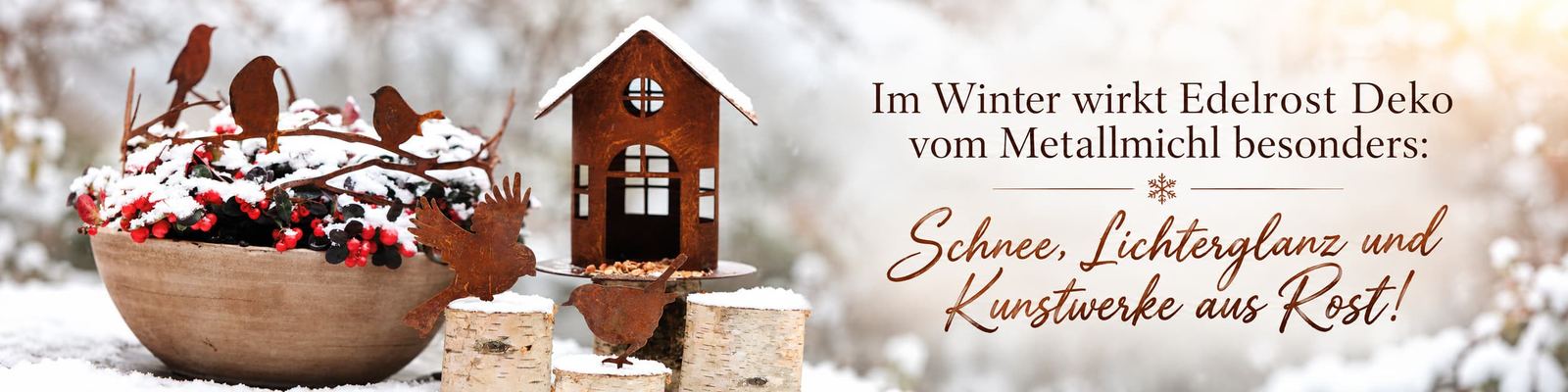 Vögel und Vogelhaus aus Edelrost im Schnee